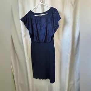 Classy and comfortable navy blue dress! Worn once by Grandmother of the groom.
